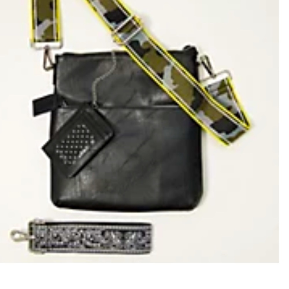 Ahdorned black camo strap with silver hardware. Strap only.